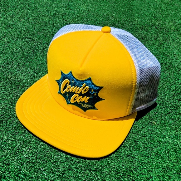 2024 San Diego Comic Con Pop Culture Bozemen Yellow Snap-Back Trucker Hat NWOT - Picture 1 of 3